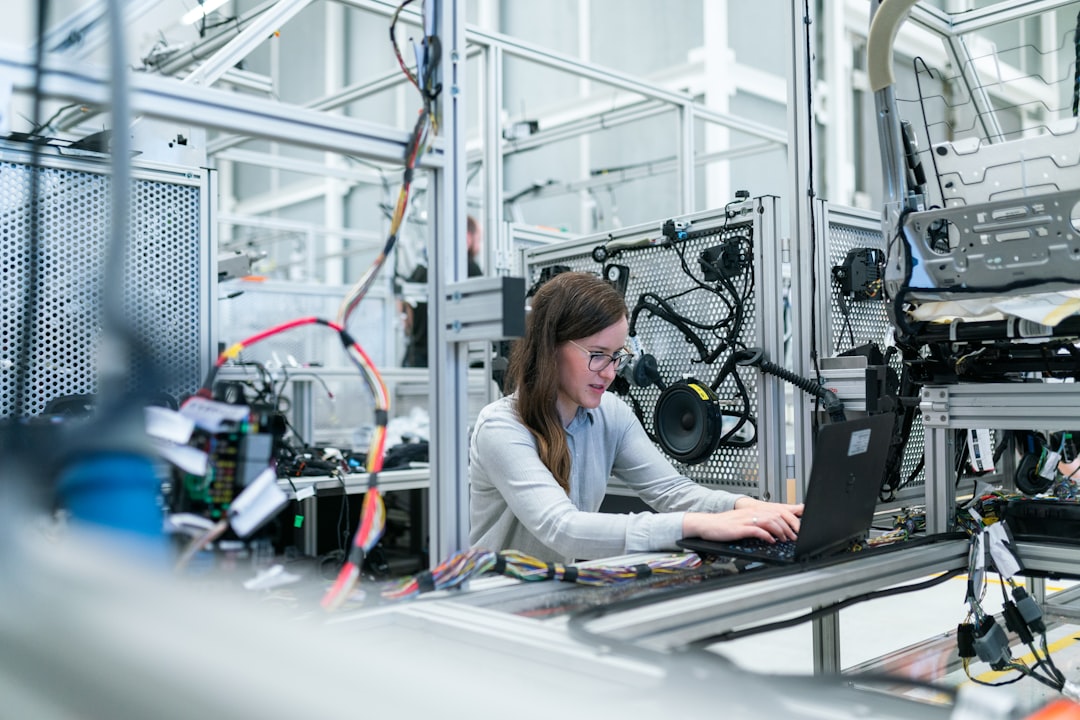 Manufacturing engineer using digital SOP software in 2026