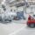 Automotive technicians working in a bright workshop