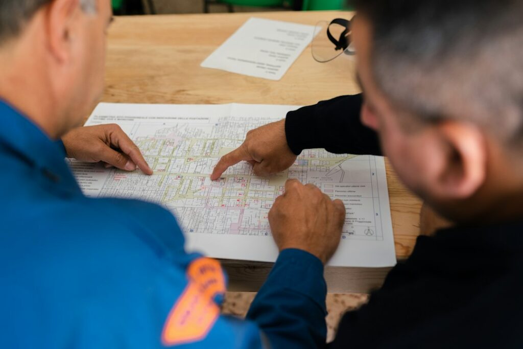 Engineering team reviewing a technical plan during root cause analysis