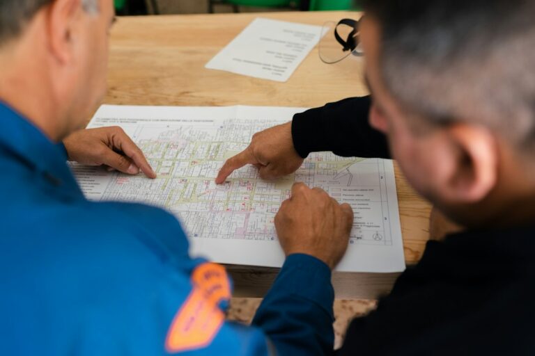 Engineering team reviewing a technical plan during root cause analysis